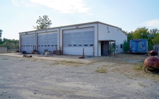 No Reserve Large Commercial Shop, Home, and Vacant Lots Auction